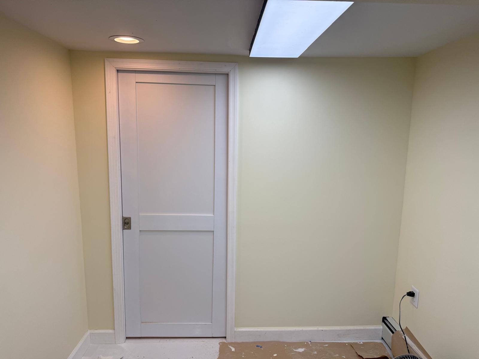 White shaker door with fresh paint and trim
